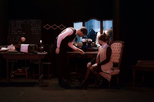 Man and Woman Performing during a Theater Play 