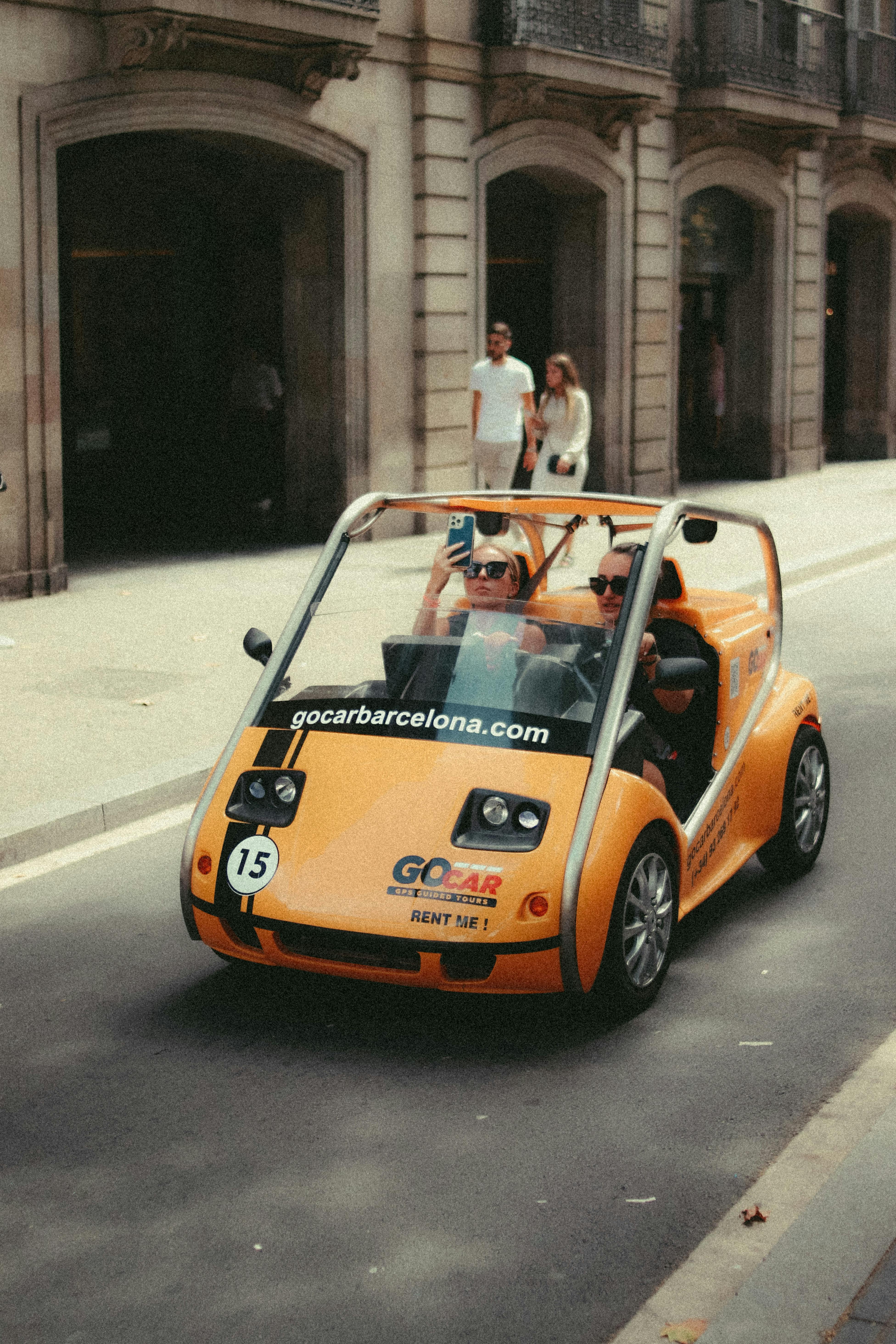 woman driving a scooter car