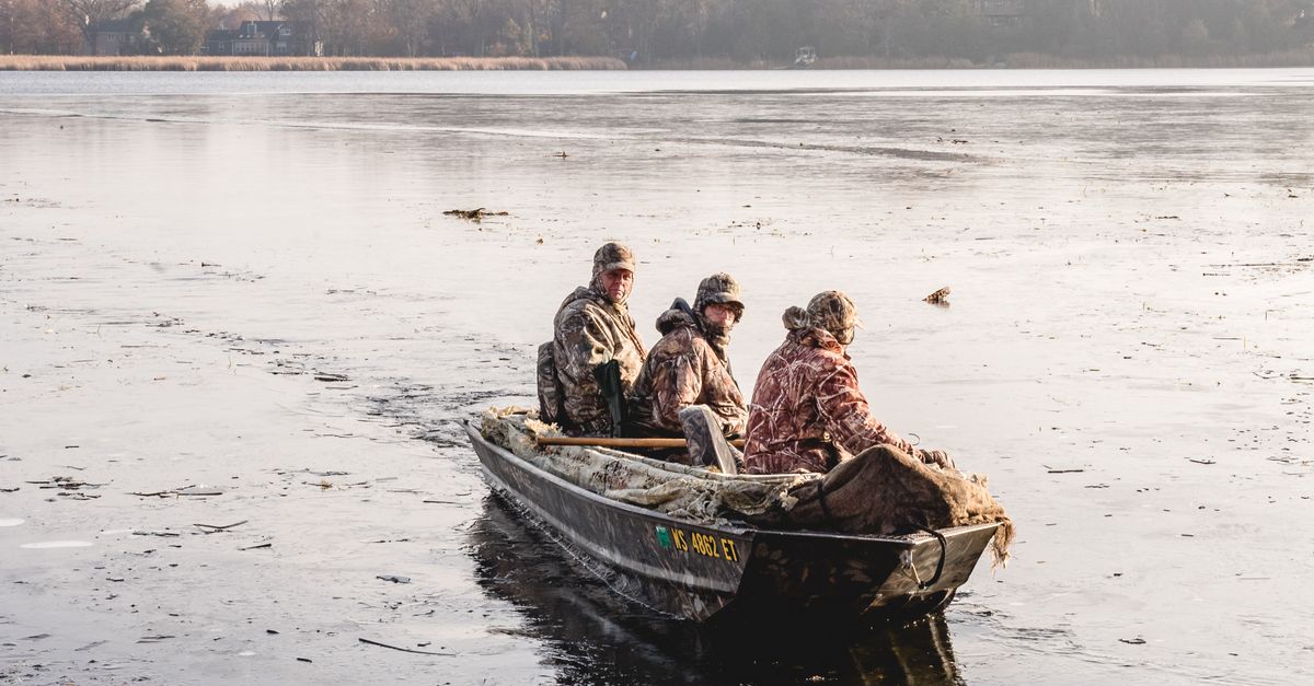 Group of Men Riding a Boat · Free Stock Photo