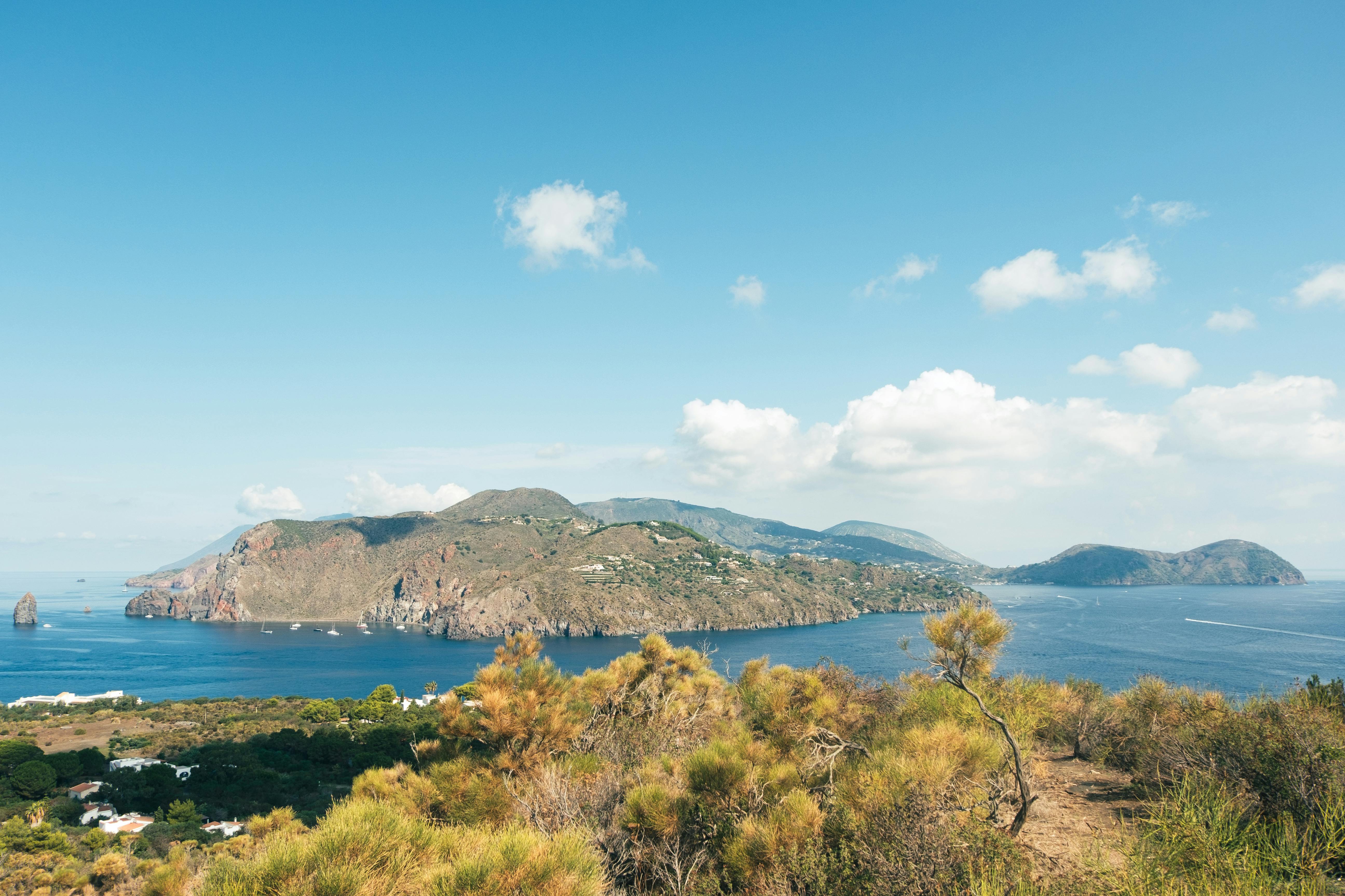 Beautiful panoramic view of Panarea Island with clear skies and calm sea in summer.