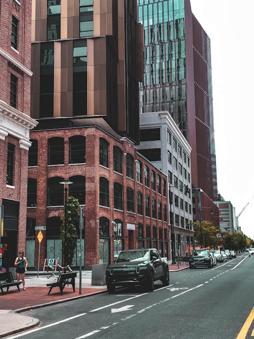 Cars Parked Beside City Buildings