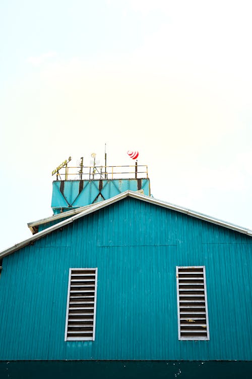 Blue Facade of a Wooden Building 