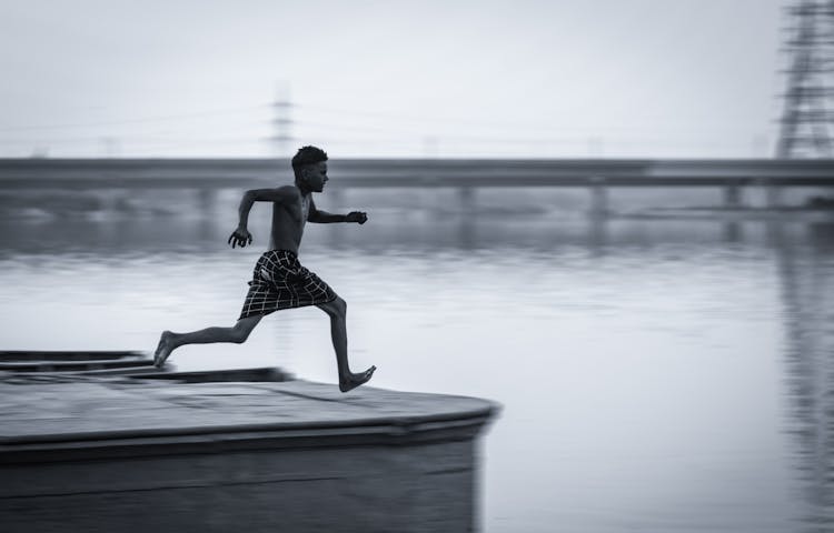  Boy About To Dive Into River Yamuna