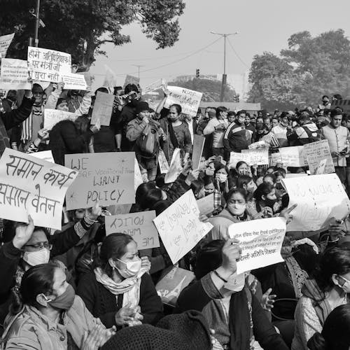 Black and White Photo of Women Protesting with Banners
