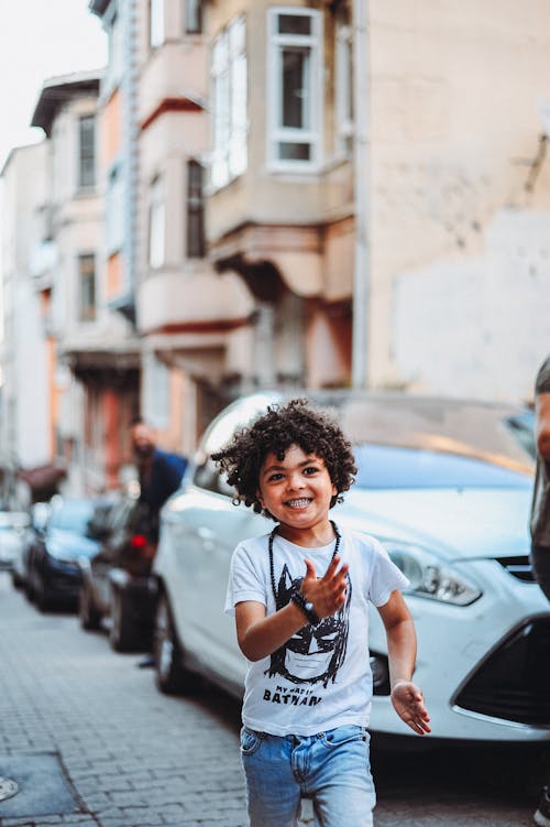 Boy in White Shirt Running