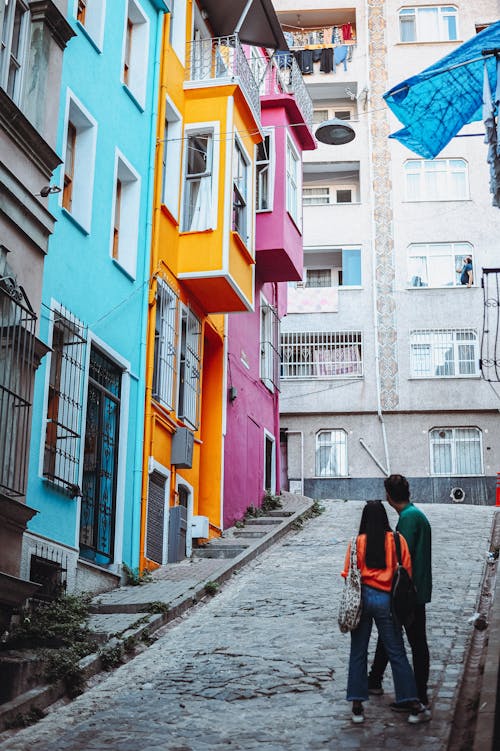 A Couple Standing over Uphill Street