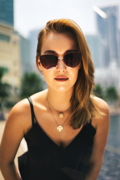 A Woman Wearing Sunglasses 