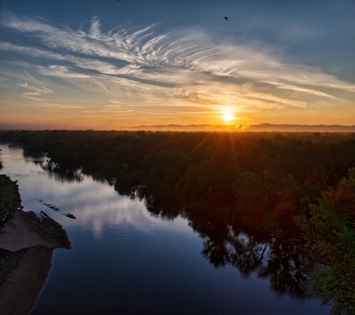 An Aerial Shot of a River during the Golden Hour