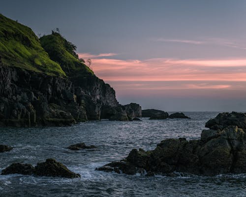 Rocks on the Ocean during Sunset