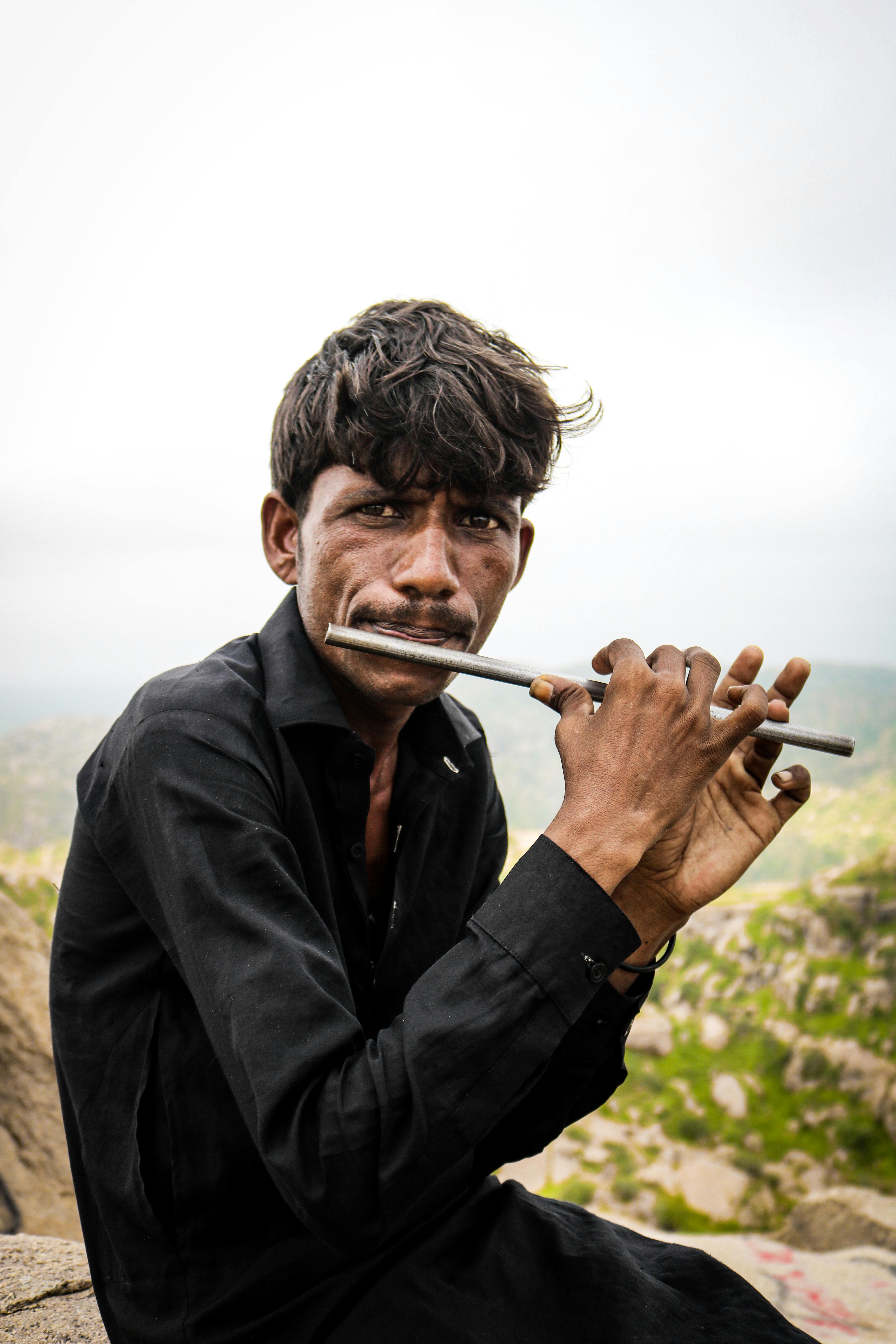 Man Playing Flute · Free Stock Photo