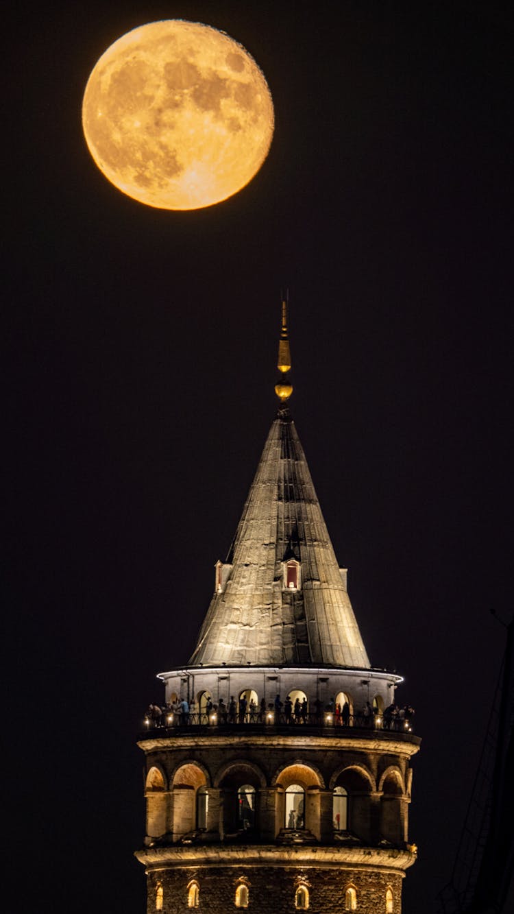 The Moon Above A Tower