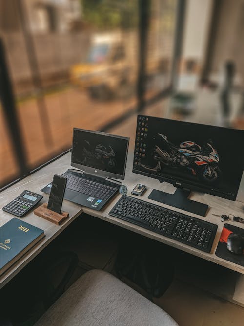 A Desk with a Laptop and a Desktop Computer