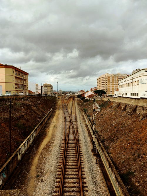 Free A Railway under a Cloudy Sky Stock Photo