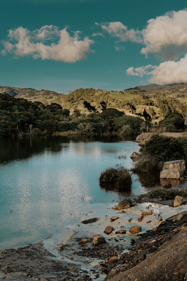 Lake Surrounded By Mountains