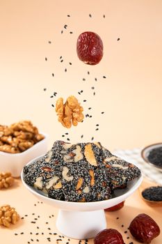 A healthy snack with seeds, nuts, and dates, perfect for a nutritious bite.