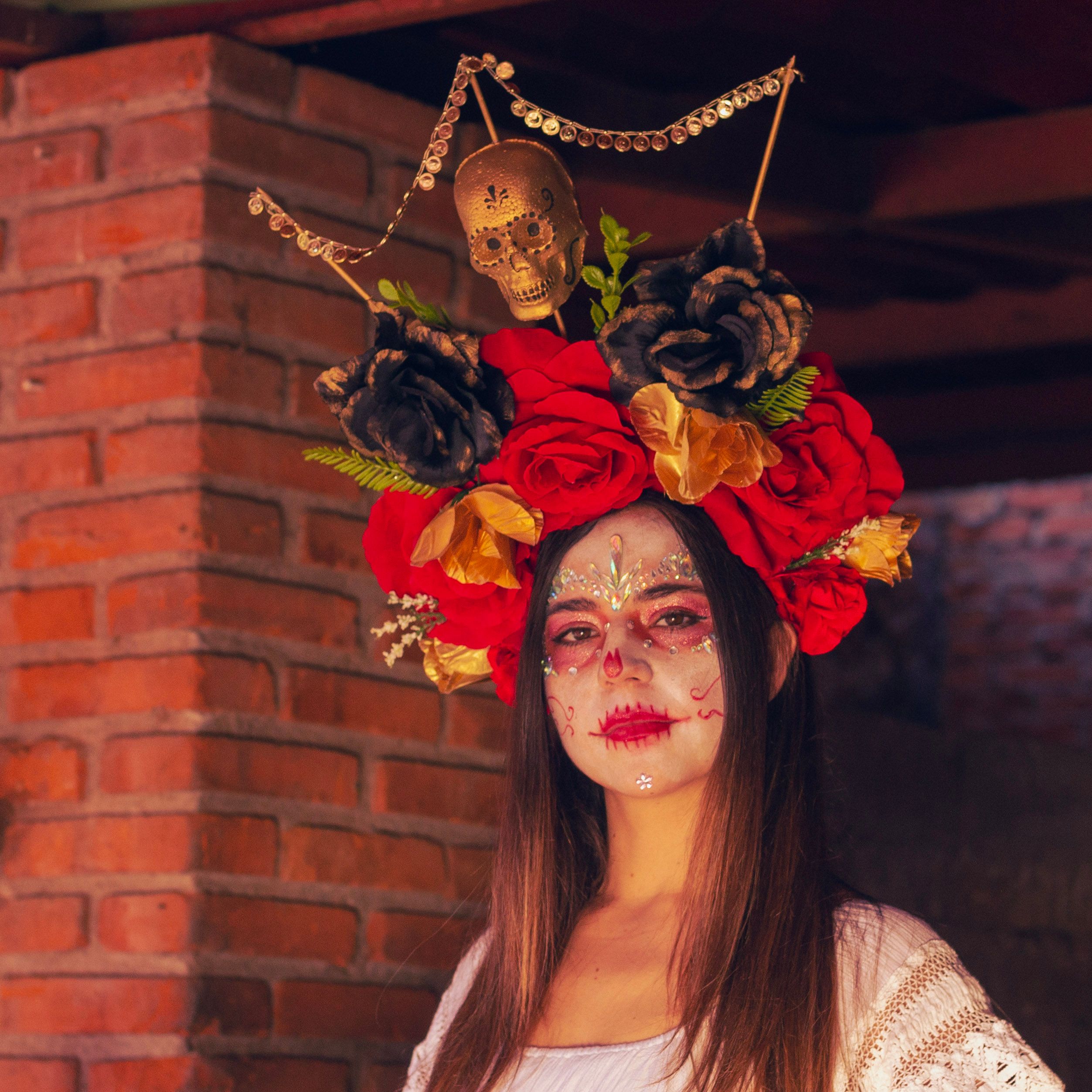 Woman Wearing Art Makeup and Floral Headdress