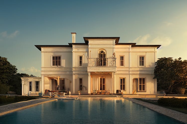 Mansion In Front Of A Pool During Dusk