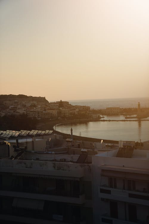 Sea and Coastal City at Dusk 