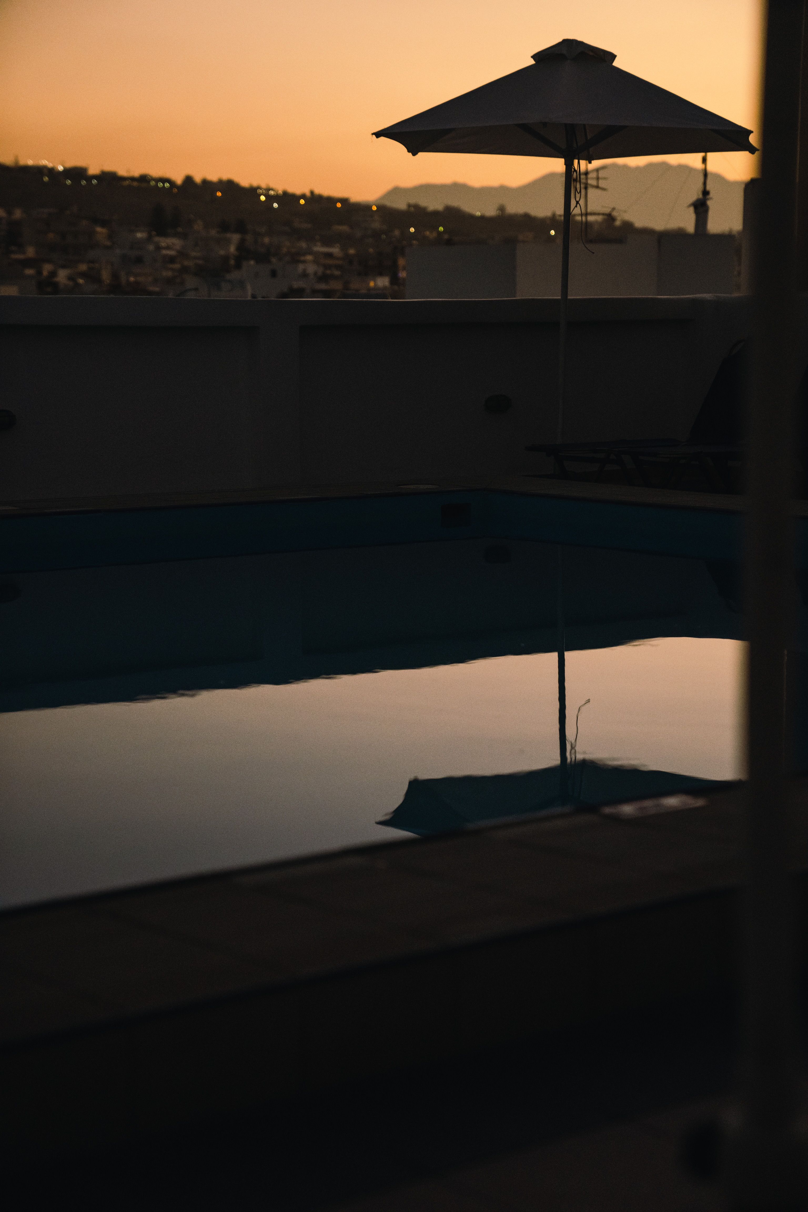 Artist's impression: rooftop terrace with a plunge pool at dusk.