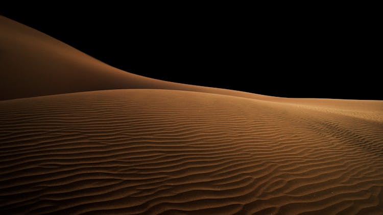 Desert With Ripples On The Sand At Night 