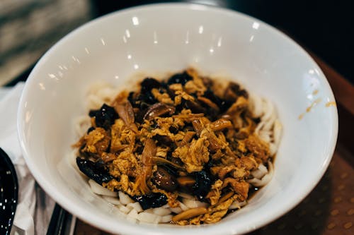 Free Close-up of a Dish with Noodles in a White Bowl  Stock Photo