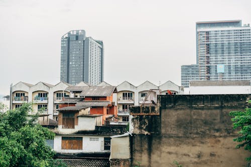 View of Residential Buildings and Modern Skyscrapers in City 