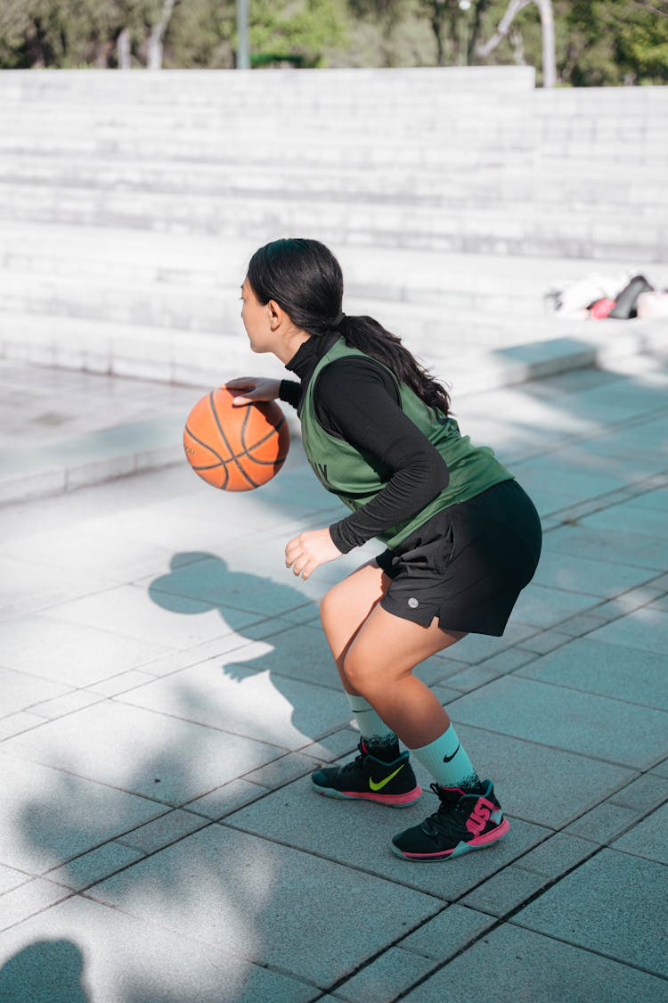 Woman Playing Basketball