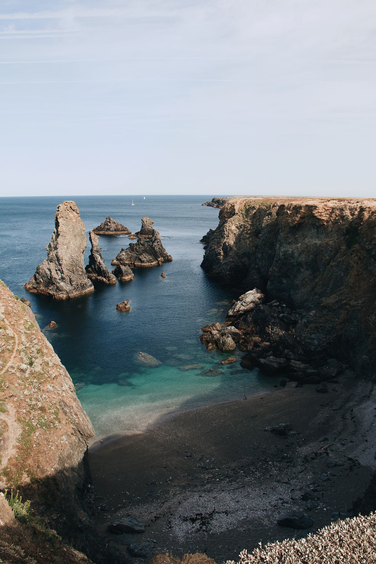 A sea-stack cove on Belle-Île with a clifftop path