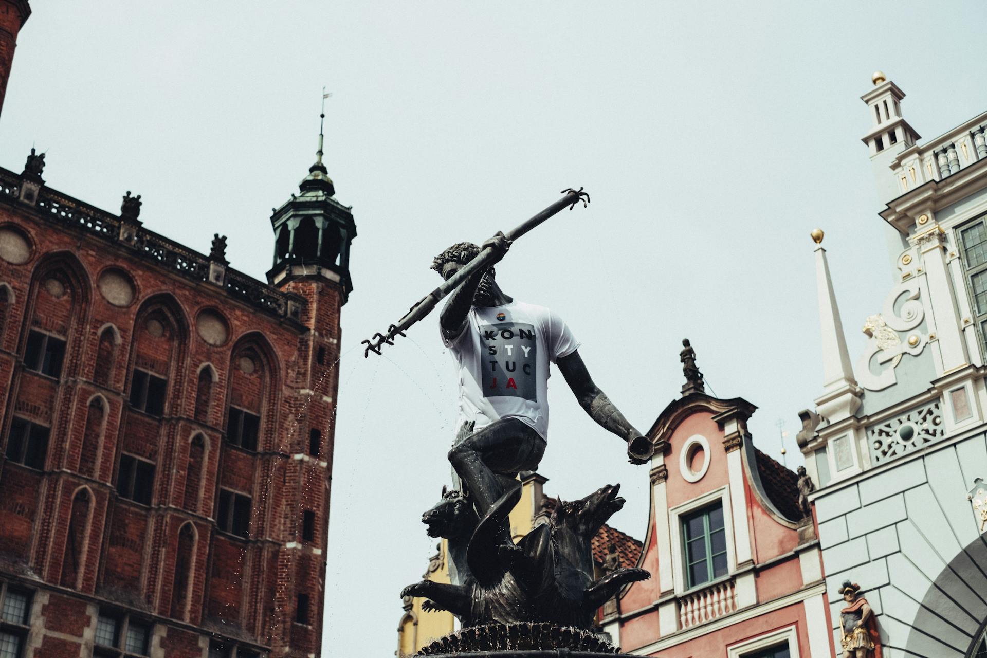 A detailed view of the Neptune Fountain in Gdańsk, showcasing its architecture and cultural significance.