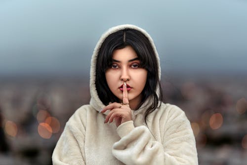 Close Up Photo of Woman Wearing Hoodie