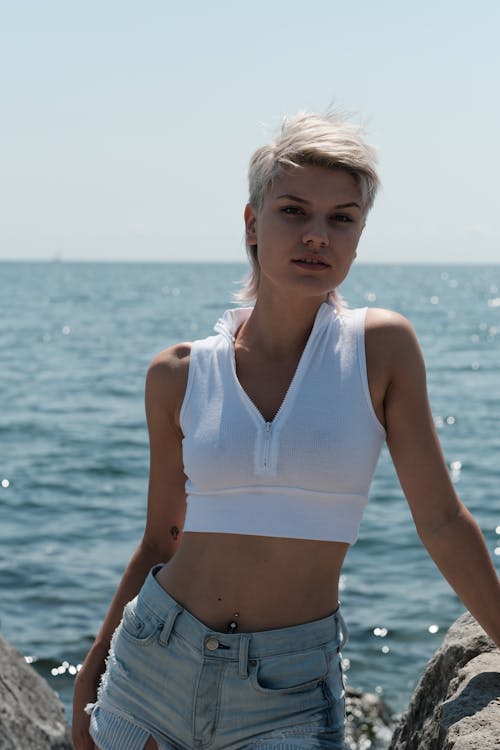 Woman with Short Hair Wearing White Crop Top