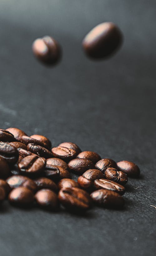 Free Roasted Coffee Beans in Close Up Photography Stock Photo
