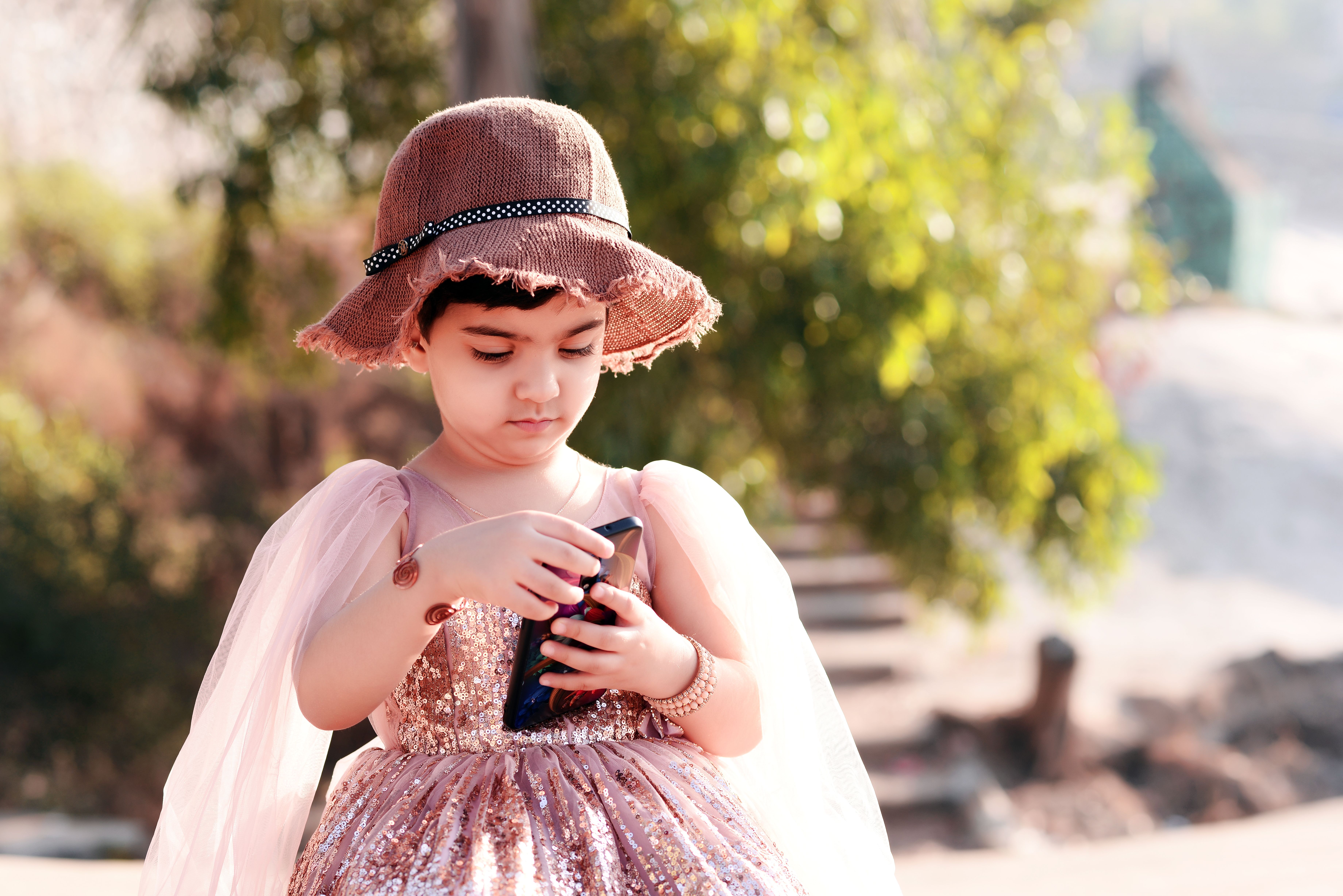 Girl in a sequin festive dress from a kids boutique in Kolkata
