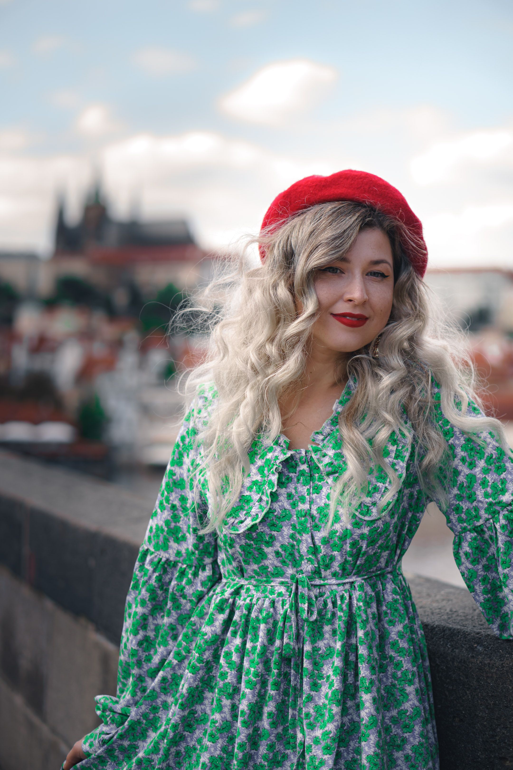 A Woman in Red Floral Dress Standing near Flowers · Free Stock Photo