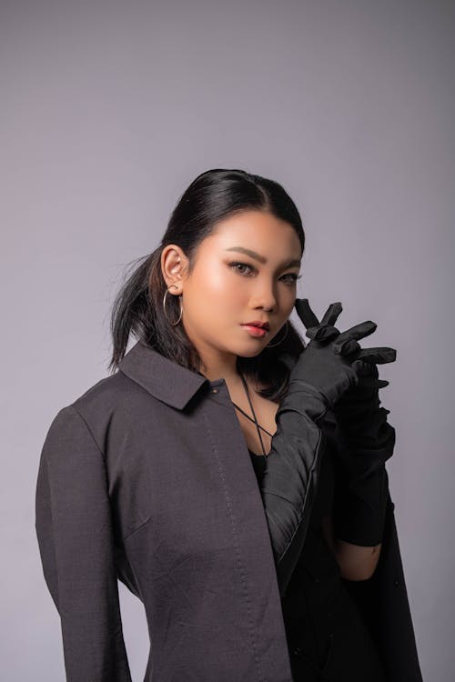 Woman in Suit and with Gloves