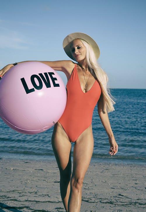 Woman Holding Pink Stability Ball