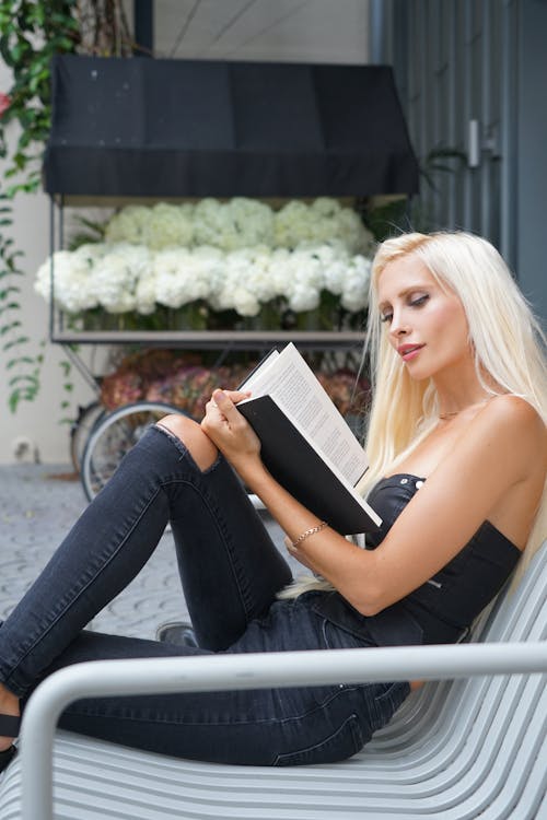 Free Woman Reading Book Stock Photo