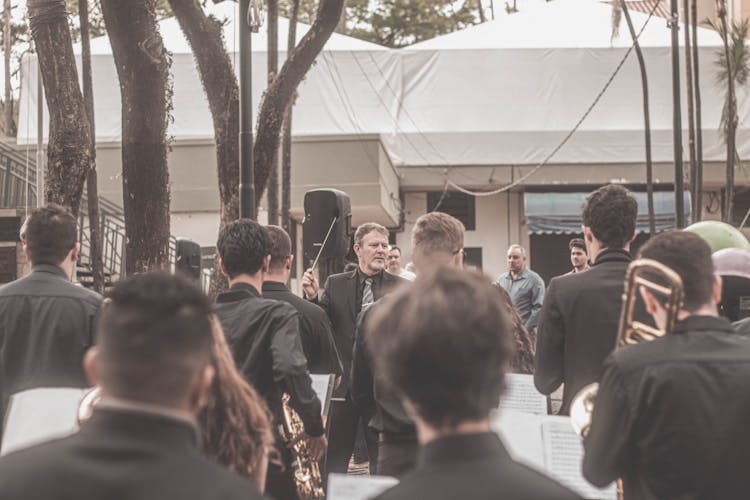 An Orchestra Performing On The Street