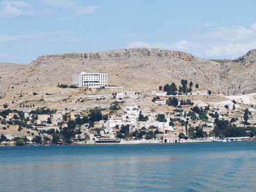 Free A picturesque view of a hillside with Mediterranean architecture in Şanlıurfa, Turkey. Stock Photo