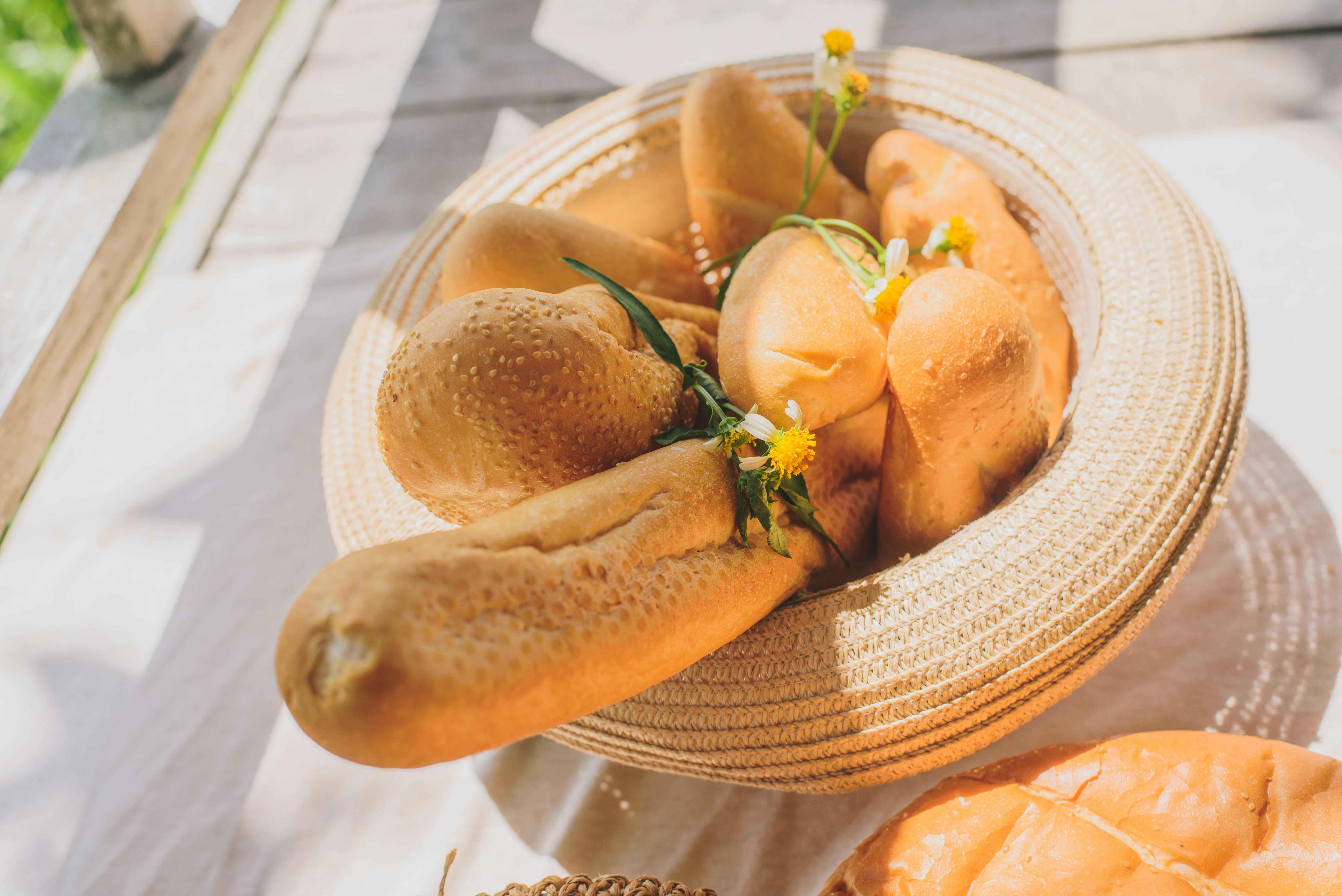 bread rolls in a woven basket