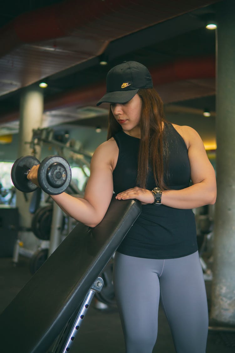 Woman Lifting Dumbbell