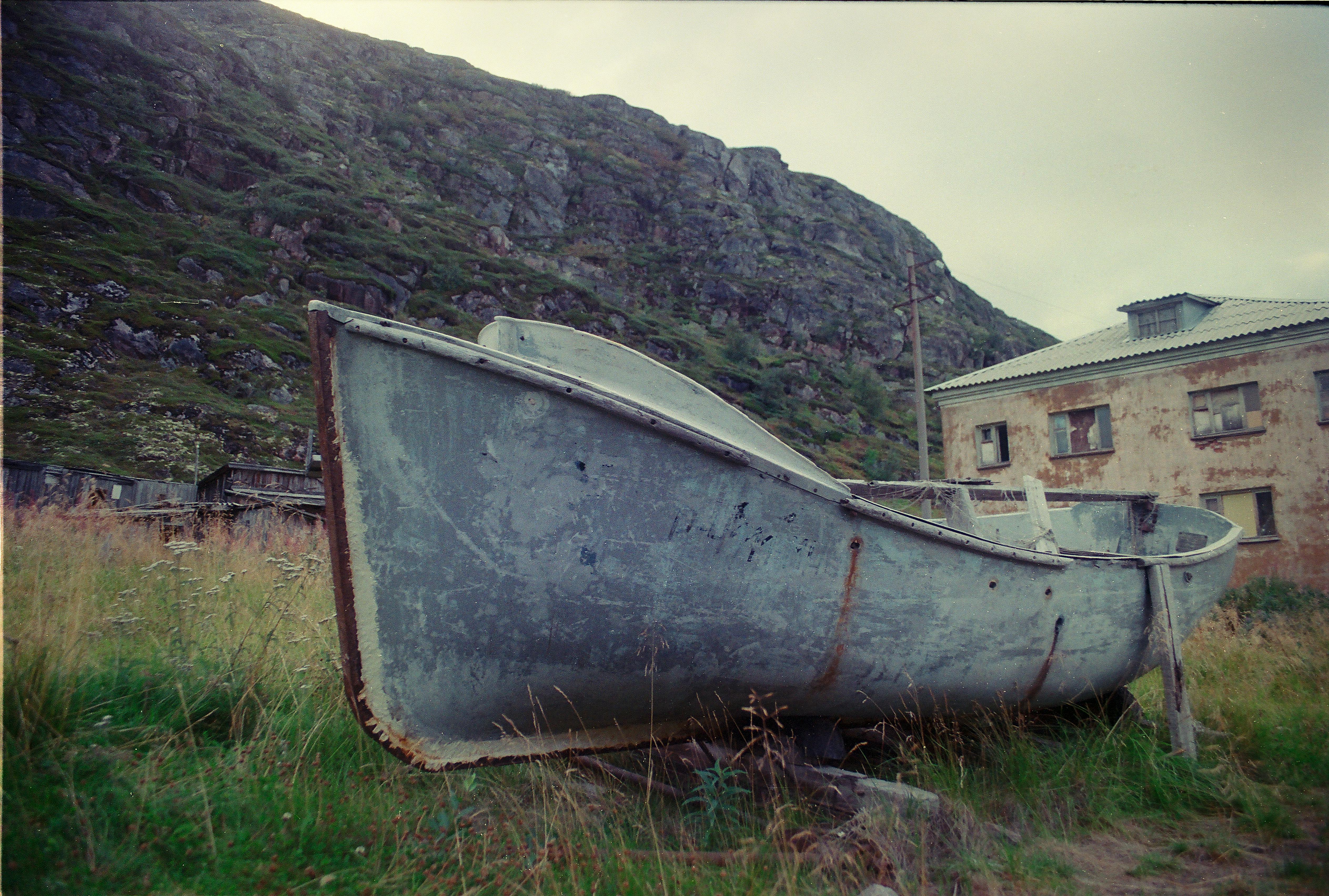 boat near house in village