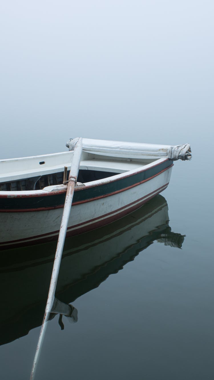 Boat On Lake In Fog