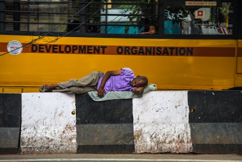 Free Man Lying On Barricades Stock Photo