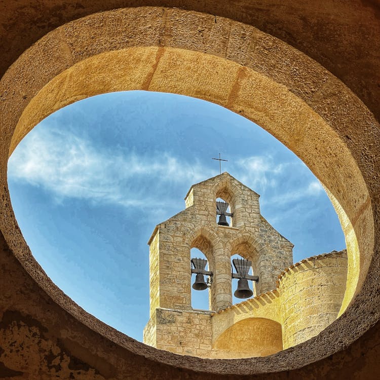 Bell Tower Seen Through Round Window