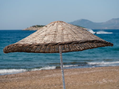 Straw Umbrella on the Beach 