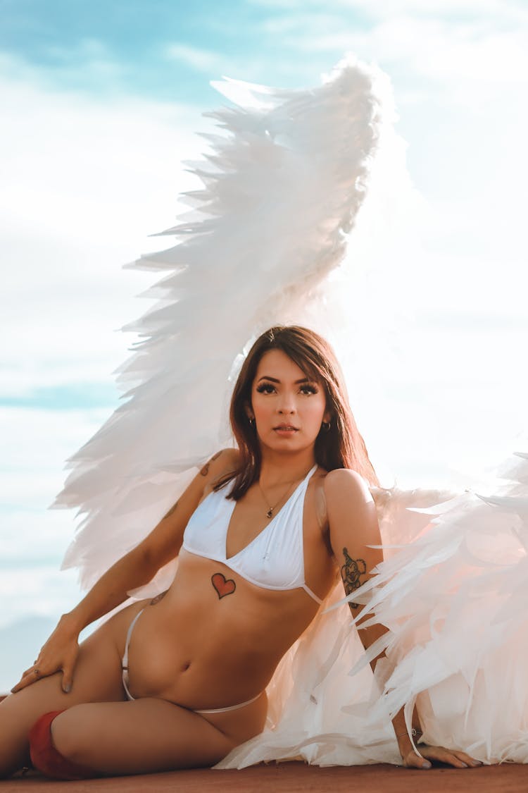 Woman In White Bikini With Angel Wings