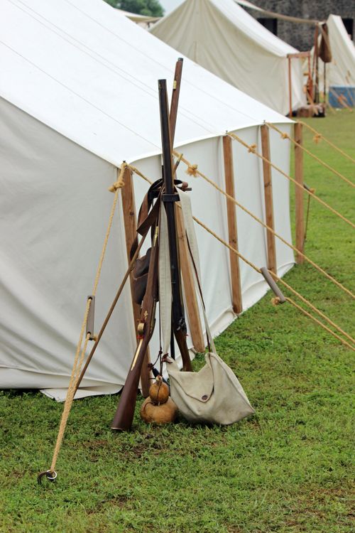 Free Historical military encampment with canvas tents and antique muskets, Goliad, Texas. Stock Photo