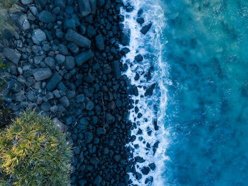 Body Of Water And Rocks