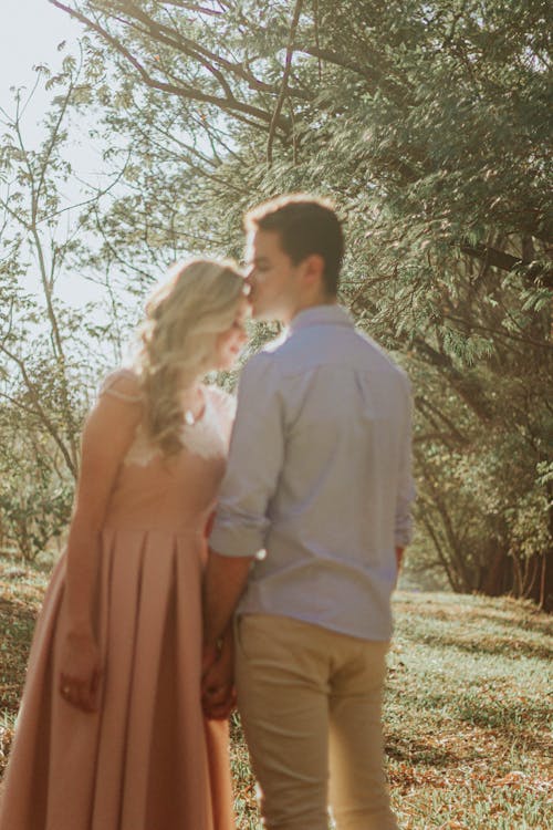 Man Kissing His Wife